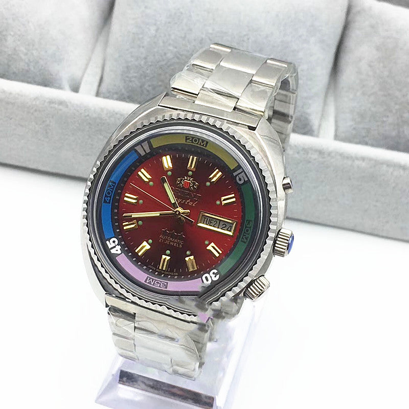 Red dial Orient Crystal automatic diver on a stainless steel bracelet