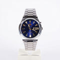 Blue dial Orient Crystal 3 Star automatic watch standing on a display block