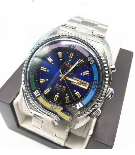 Angled view of the blue dial Orient Crystal automatic diver showing the multicolor bezel